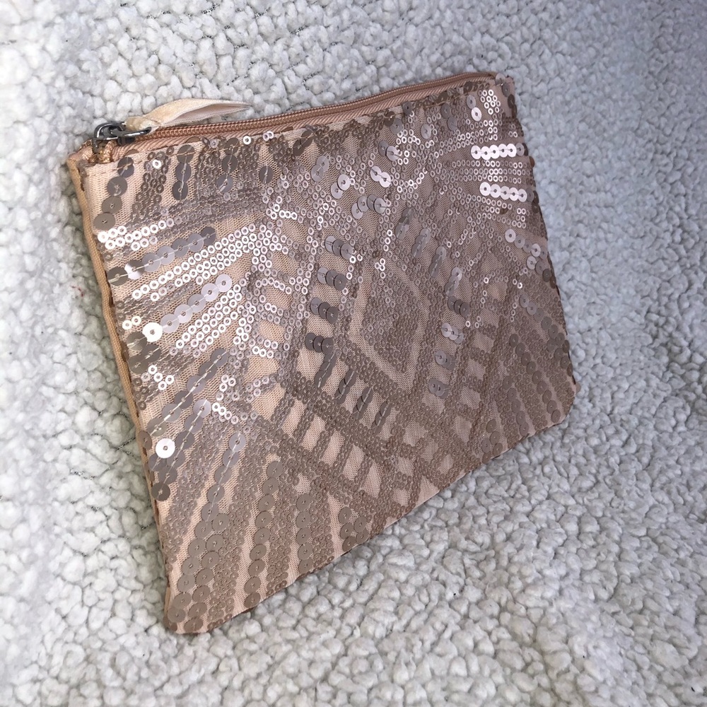 Big makeup bag or cute little bag